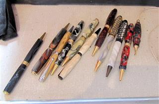 A sample of Bernard's pens and light pulls